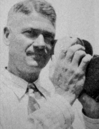 Amos Hoff holding a favorite eyepiece, 1947